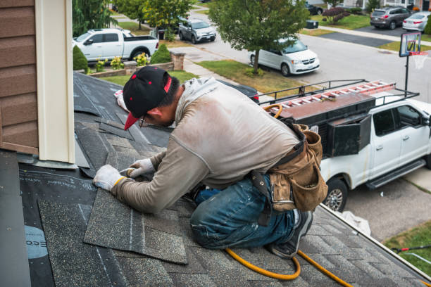 Professional Roofing technician working in Candler, FL